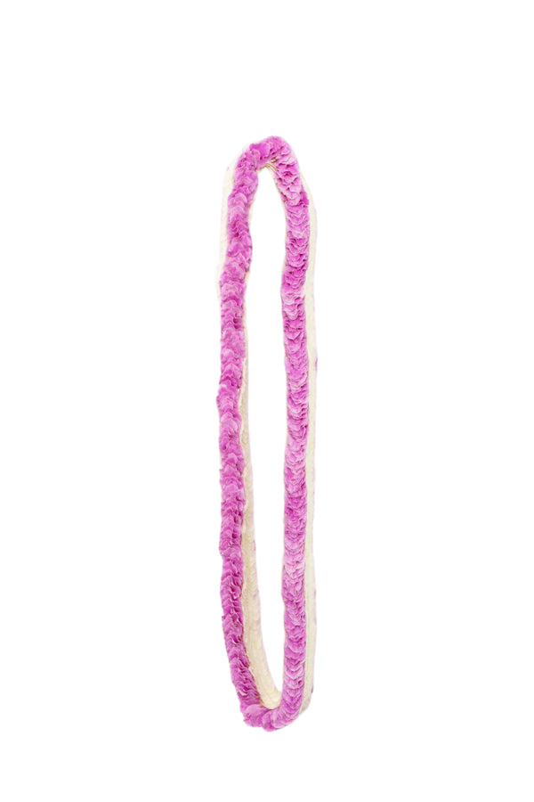 Pink orchid lei made of 900 flat orchid petals, displayed against a white background