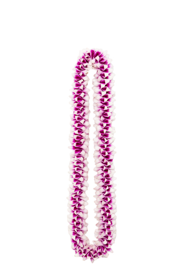 Spiral lei made of purple orchid flowers folded to create a dimensional, textured look, isolated on a white background.