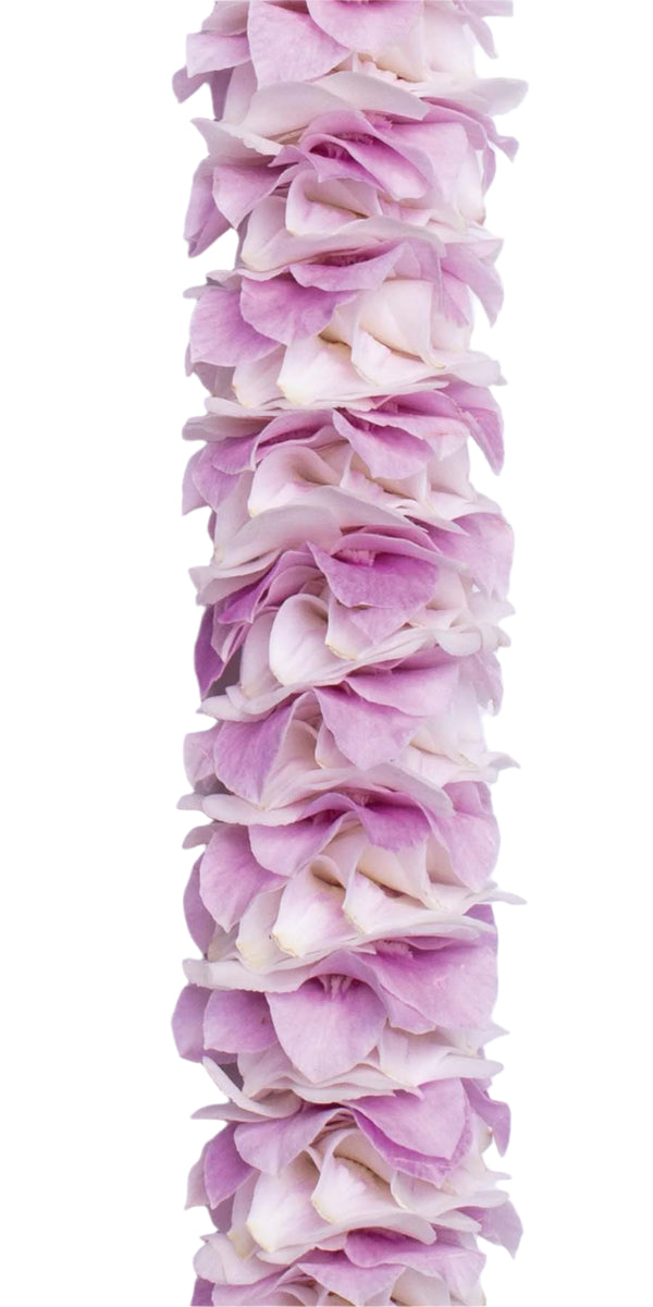 Close-up of a pink premium spiral orchid lei showing an intricate pattern of small pink petal sections alternating with larger light-colored orchid blossom backings, highlighting texture and detail.