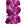 Close-up of a flat lei featuring layers of soft purple orchid petals, highlighting the fluffy, plush texture and rich coloration of the blossoms.