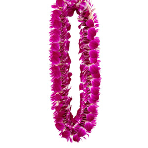 A flat, fluffy lei made of layered purple orchid petals arranged in a full, dense design, displayed on a white background.