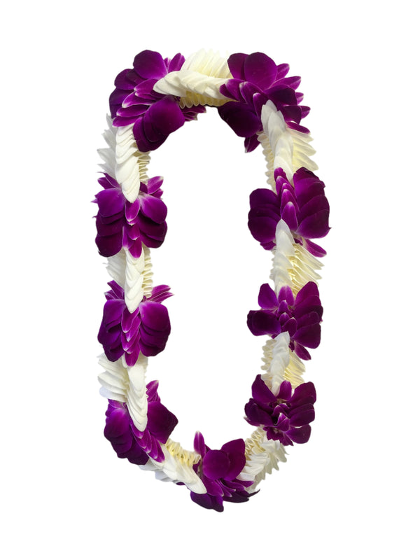 A full deluxe lei featuring overlapping sections of white and purple orchid blossoms, arranged in a lush, layered design against a white background.