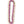 A flat orchid lei made with pastel pink petals on the edges, deeper pink blossoms, and a hint of jade green in the center, laid out on a white surface.