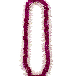 A flat deluxe orchid lei featuring pastel pink flared edges and a dark purple center, laid out on a white background.