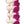 Close-up of a flat deluxe orchid lei showing the overlapping arrangement of purple and white petals, emphasizing the layered structure and contrast in color.