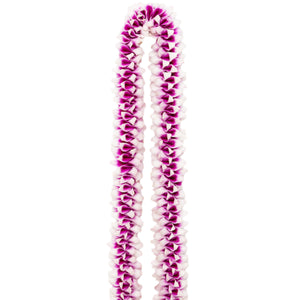 Spiral lei made of purple orchid flowers folded to create a dimensional, textured look, isolated on a white background.