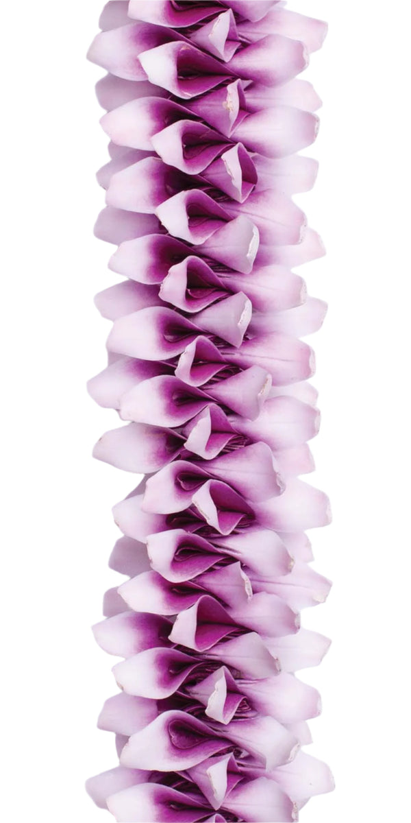 Close-up of a purple orchid spiral lei showing folded petals that create a rich, dimensional texture against a white background.