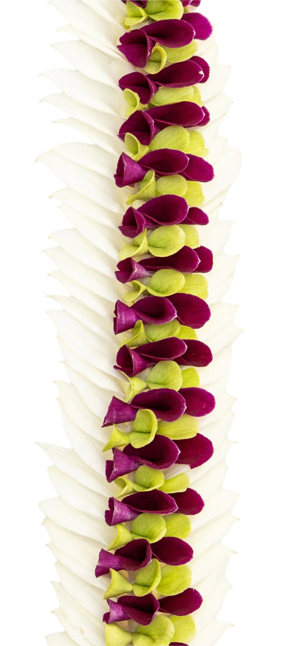 Close-up of a deluxe lei featuring layered orchid petals in deep purple, jade green, and creamy white, highlighting the texture and vibrant color contrast.
