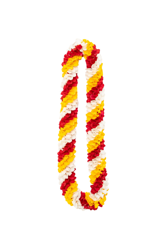 Spiral lei made of natural and sprayed orchids featuring alternating diagonal stripes of red, yellow, and white petals.