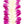 Close-up of a deluxe orchid lei showing soft, feather-like purple orchid edges and a tightly braided white orchid center, highlighting the texture and contrast against a white background.