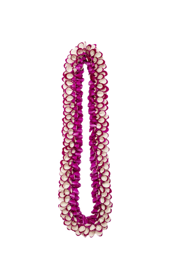 Spiral lei made of purple and white orchid petals, with white petals layered on top of purple, displayed on a white background.
