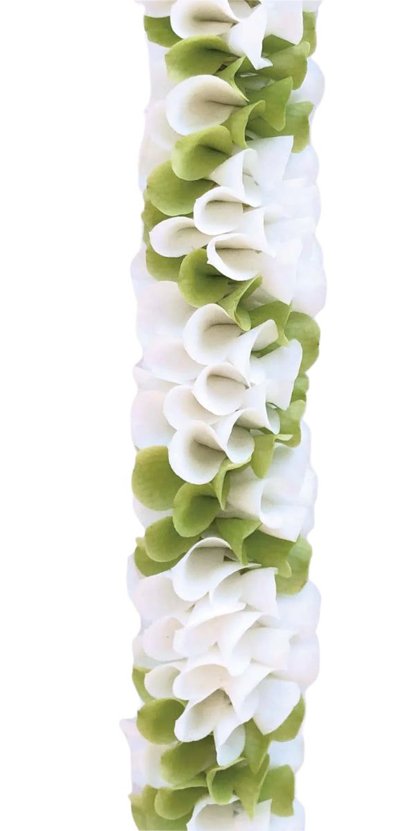 Close-up of a spiral orchid lei featuring white and jade green petals, highlighting the green petals crisscrossing elegantly over the white ones.