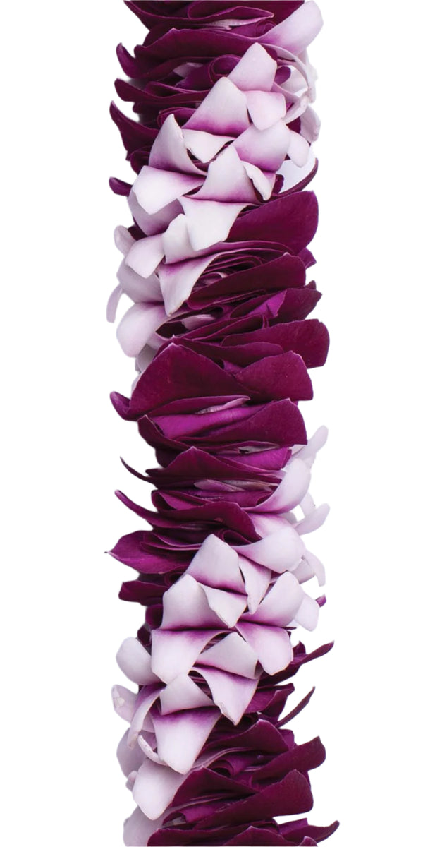 Close-up of a spiral lei crafted from purple Dendrobium orchids in multiple shades, highlighting the diagonal pattern and texture of the overlapping petals.