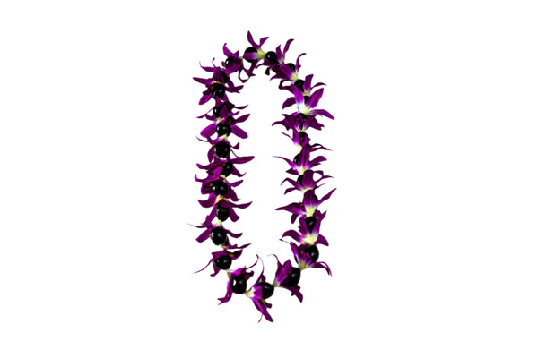 Lei made of silk fuchsia orchids and black kukui nuts, displayed against a white background.