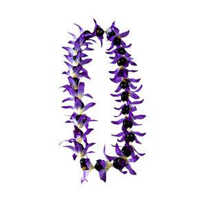 Lei made of silk purple orchids and black kukui nuts, displayed against a white background.