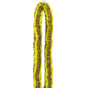Lei made of all jade orchids featuring dark purple centers, displayed against a white background